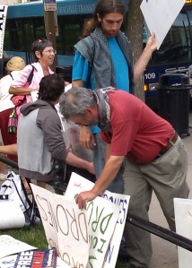 Brian Terrell Picking a Sign