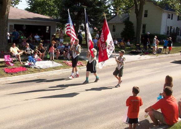 The boy scouts also have a color guard.